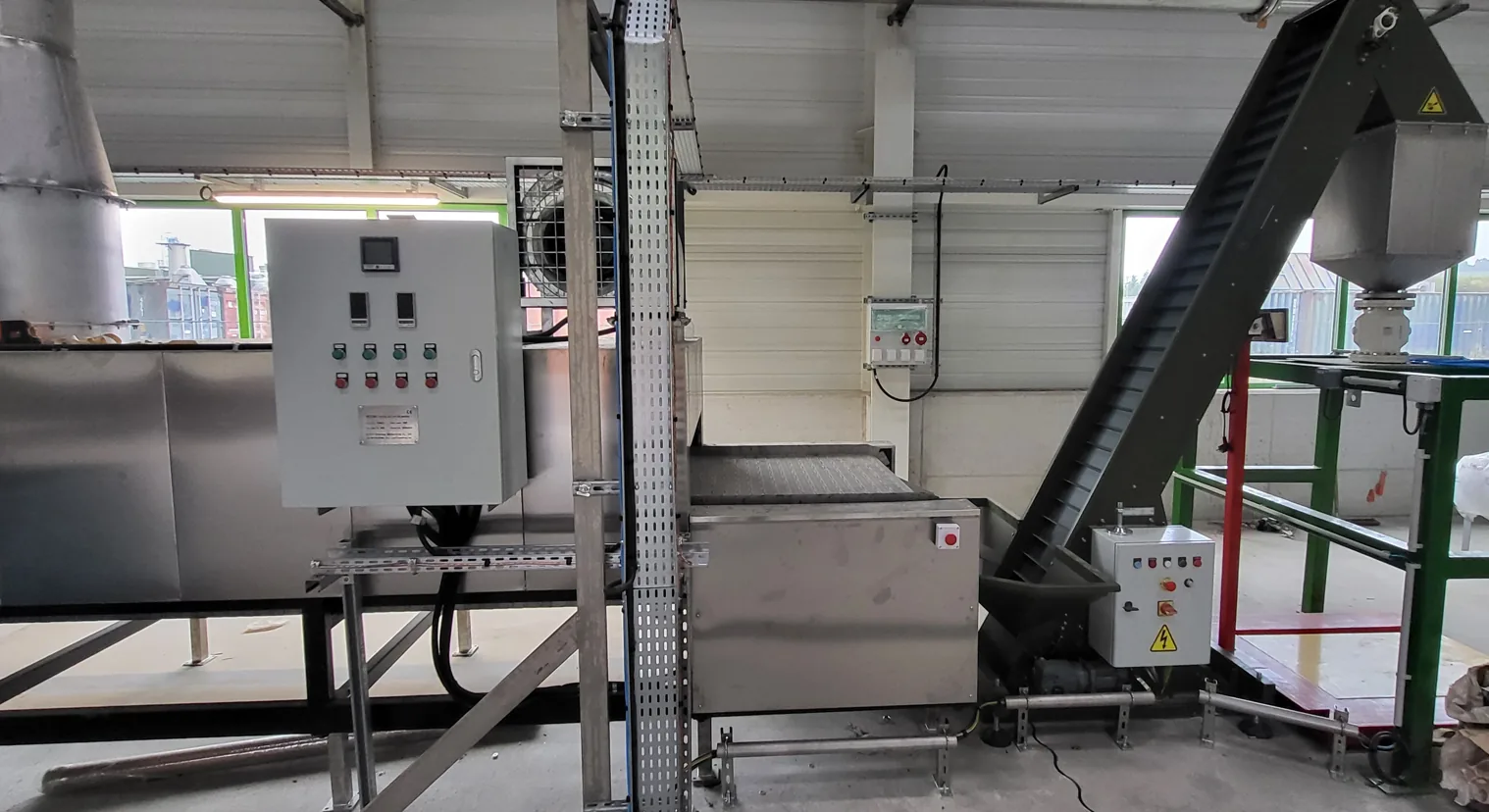 Belt cooler control cabinet and discharge conveyor at a French polymer plant