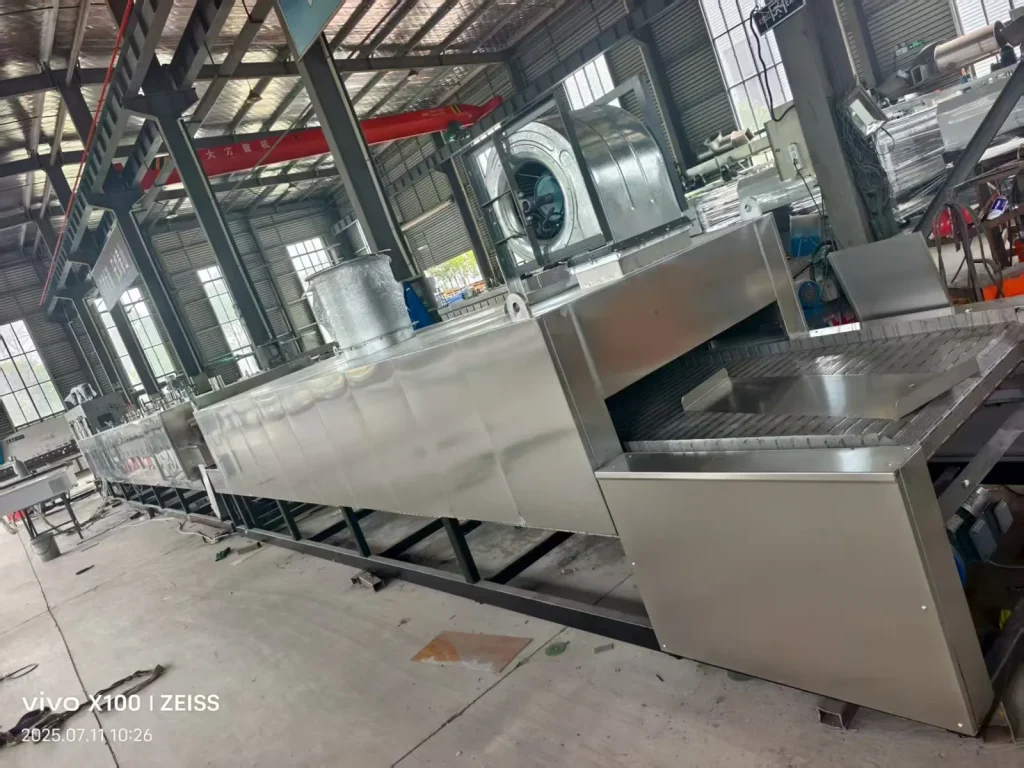 Integrated tunnel belt dryer and cooling line during factory acceptance testing
